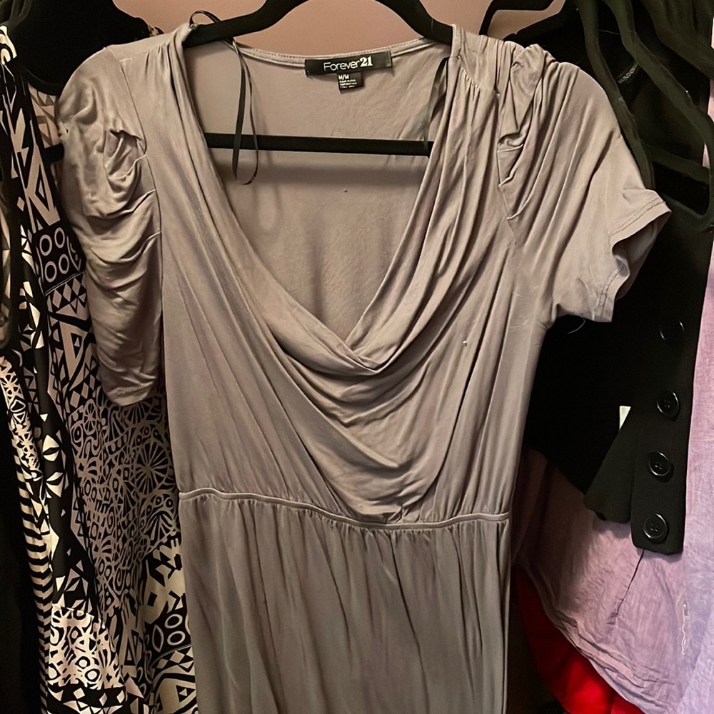 Grey dress, right around the waist with short sleeves